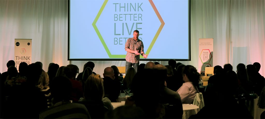 Anthony Ongaro speaking on stage
